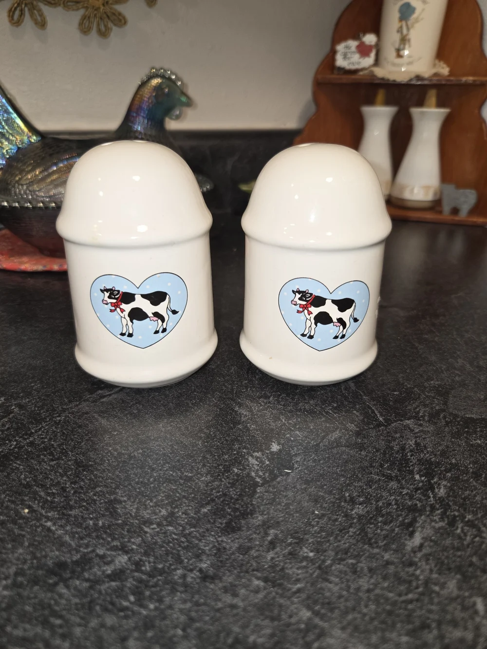 White Ceramic Salt & Pepper Shakers with Cow Heart Motif